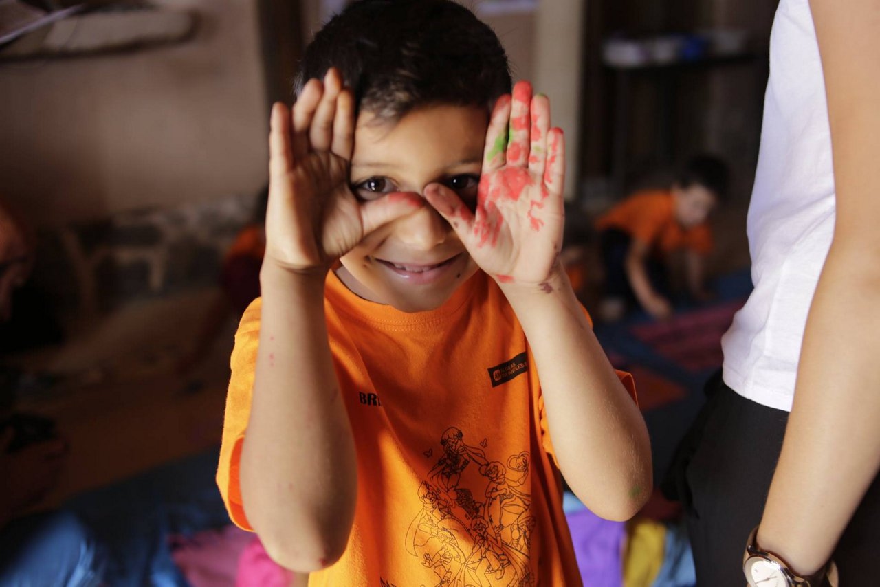 Testing our products A child from the Casa Herbalife programme.