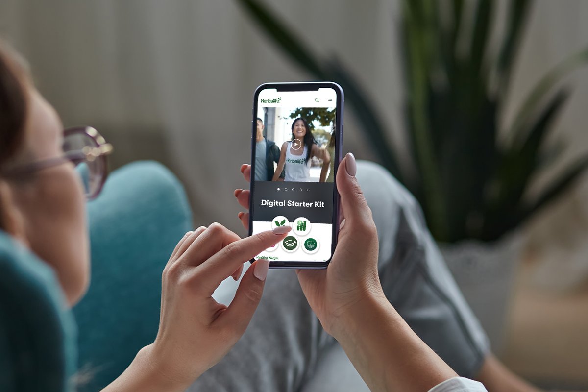 li-woman-looking-at-digital-starter-kit-on-mobile-usen.png li-woman-looking-at-digital-starter-kit-on-mobile-usen.png