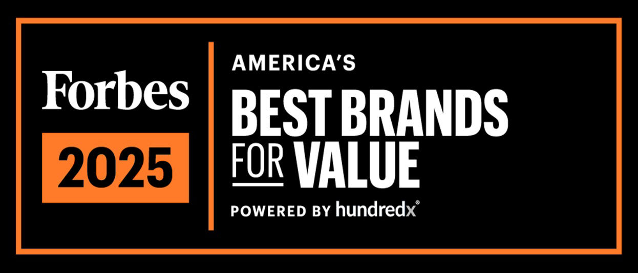 Heather Jackson, elite endurance athlete and Herbalife-sponsored runner, stands outdoors in running gear and hydration vest, looking focused before a trail run.