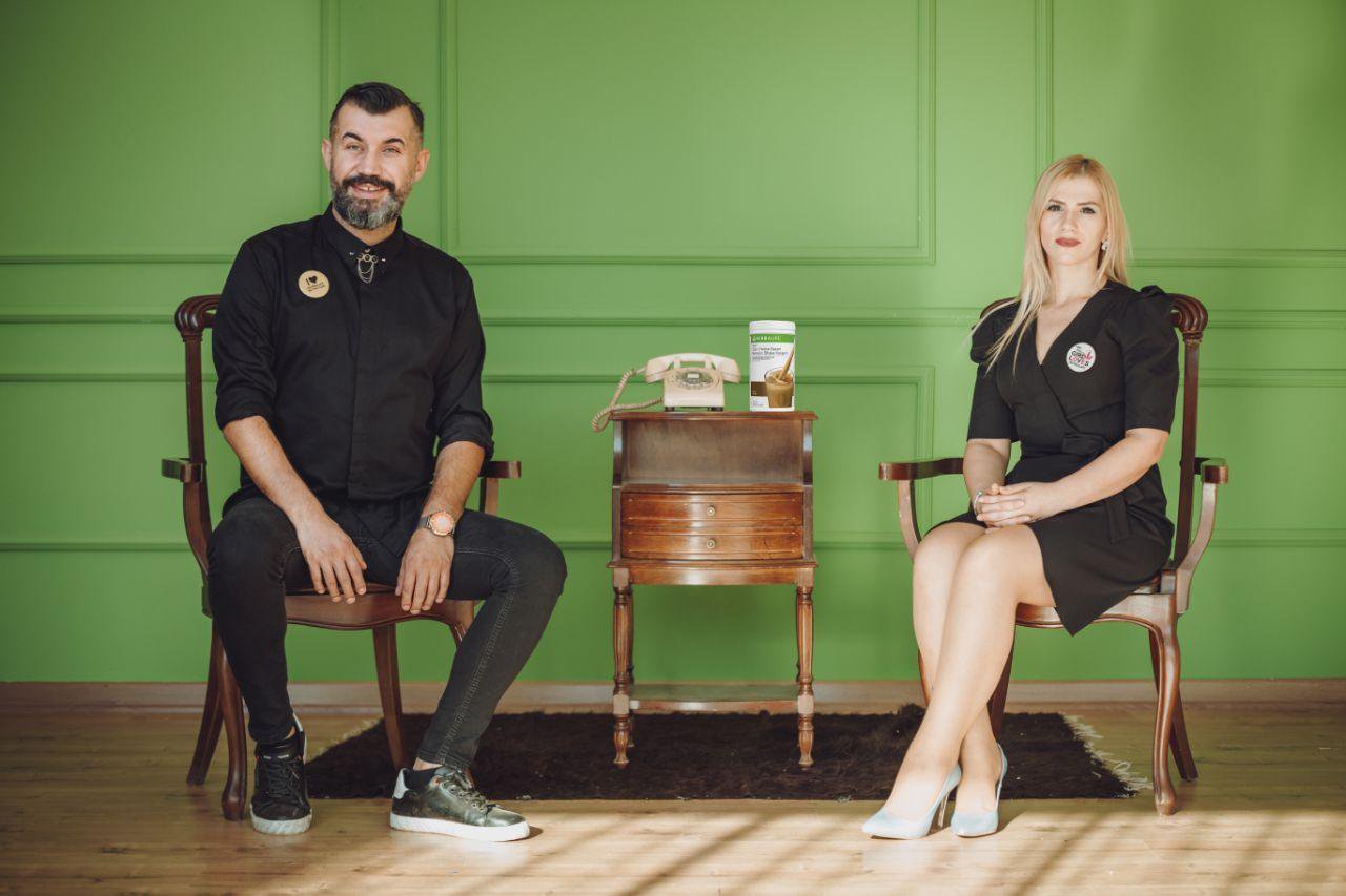 A sporty woman writing in her fitness journal to work on her New Year's resolutions Image of Distributors used during Honors 2022